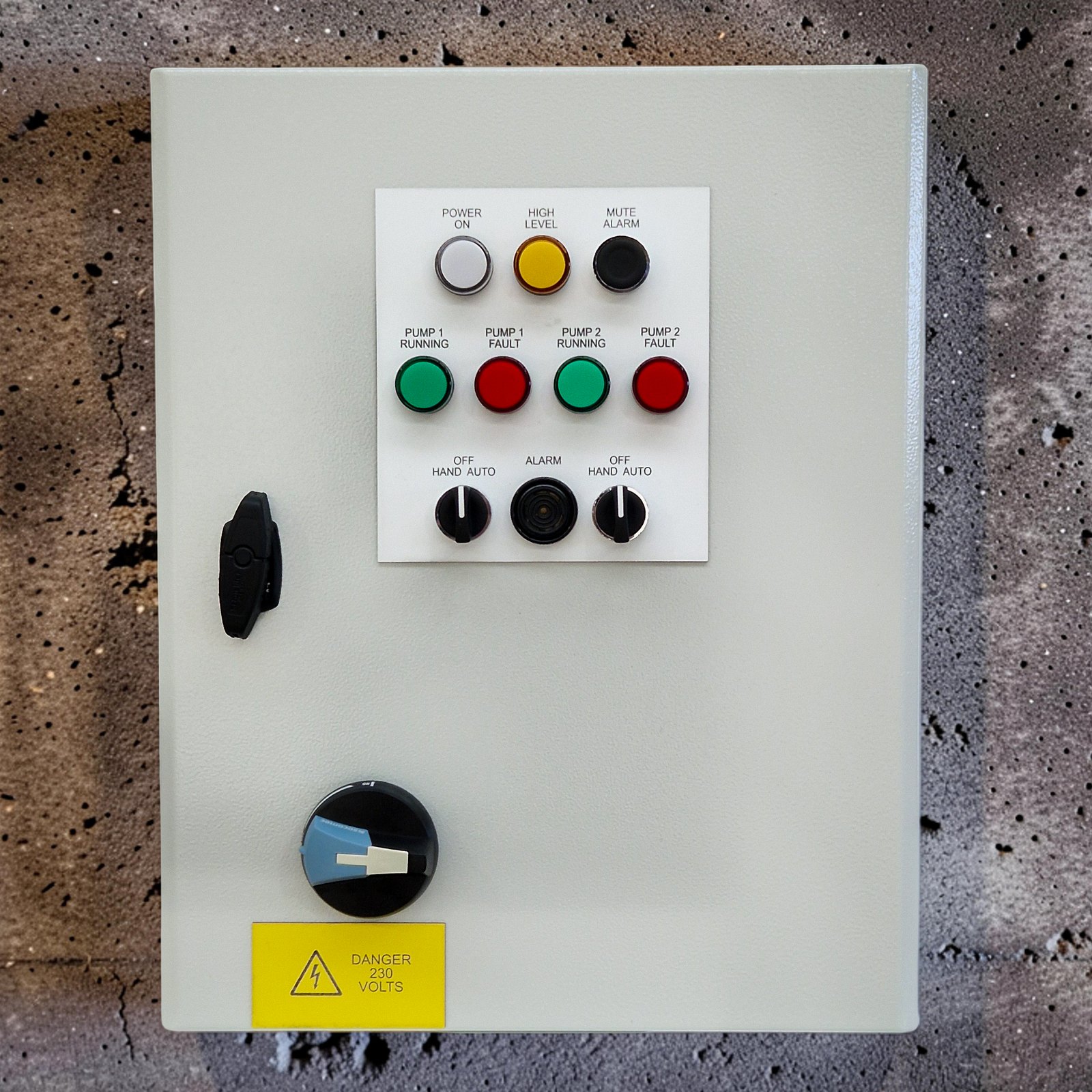 A G&G twin pump wastewater control panel on site: power, high level and mute lamps, run and fault lamps for each pump, hand/off/auto switches and the door isolator
