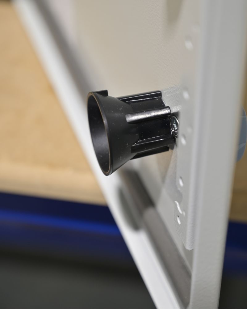 Door-interlocked isolator with shaft guide