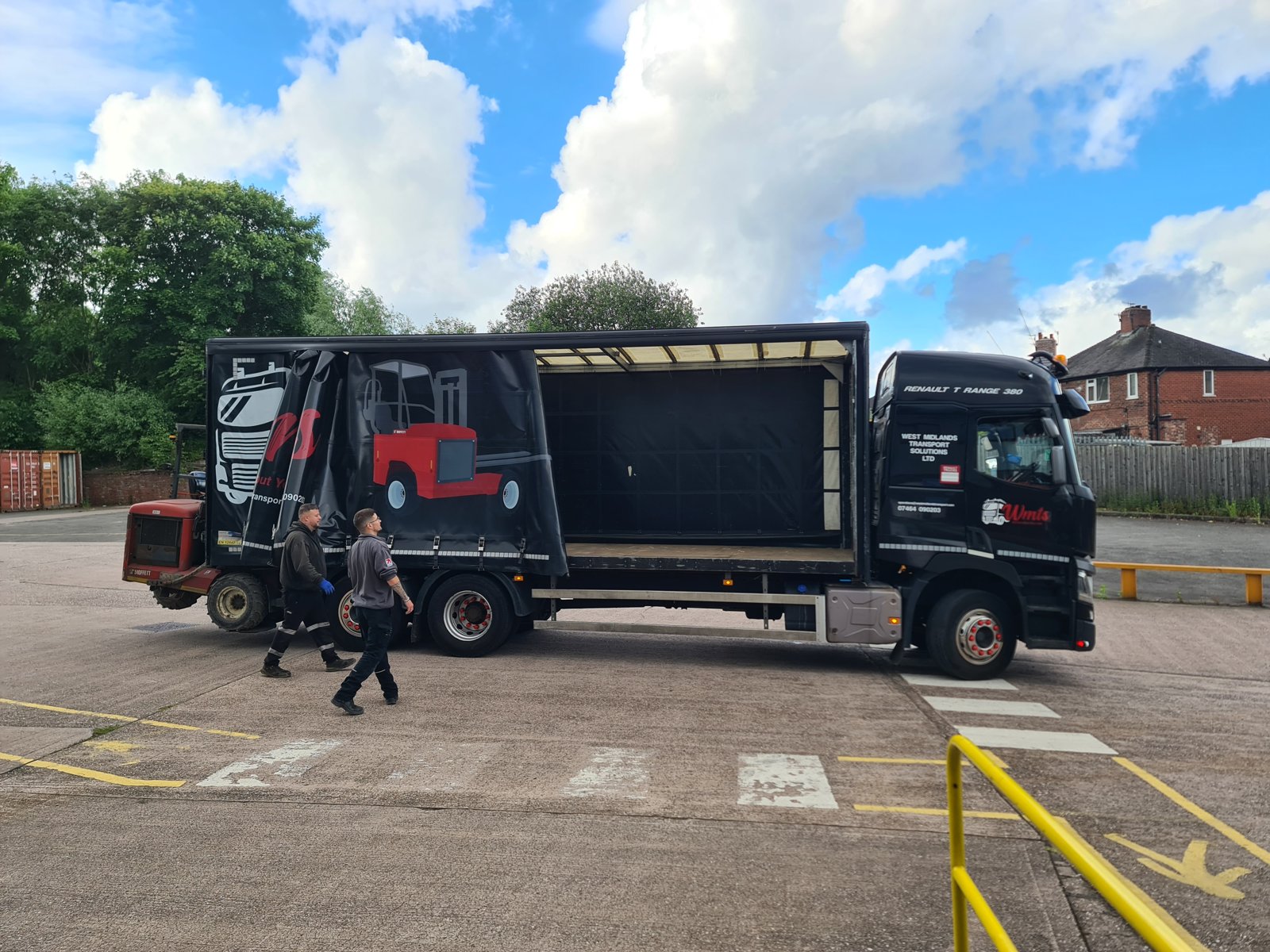 The wrapped panel sections being loaded onto a lorry for delivery to Skegness