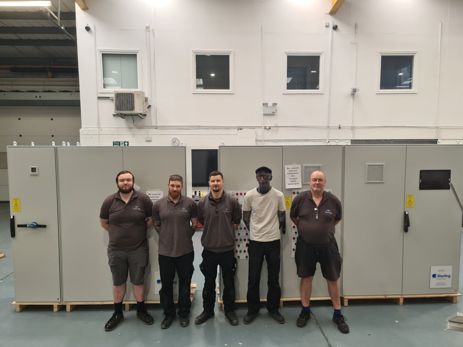 The G&G build team standing with the finished suite before despatch