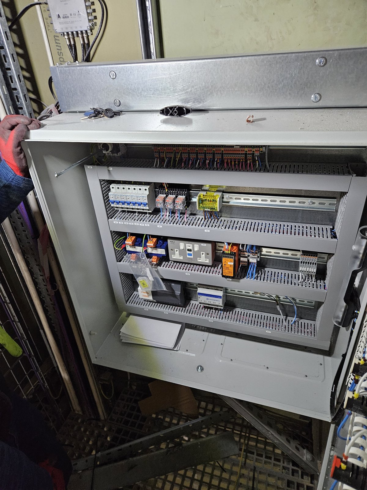 One of the smaller local control panels, door open