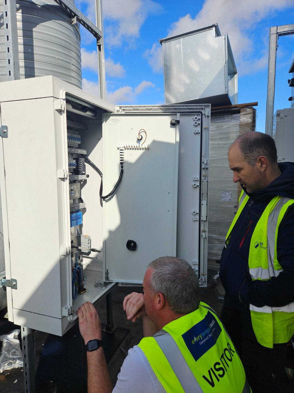 Checking the panel on the roof during installation