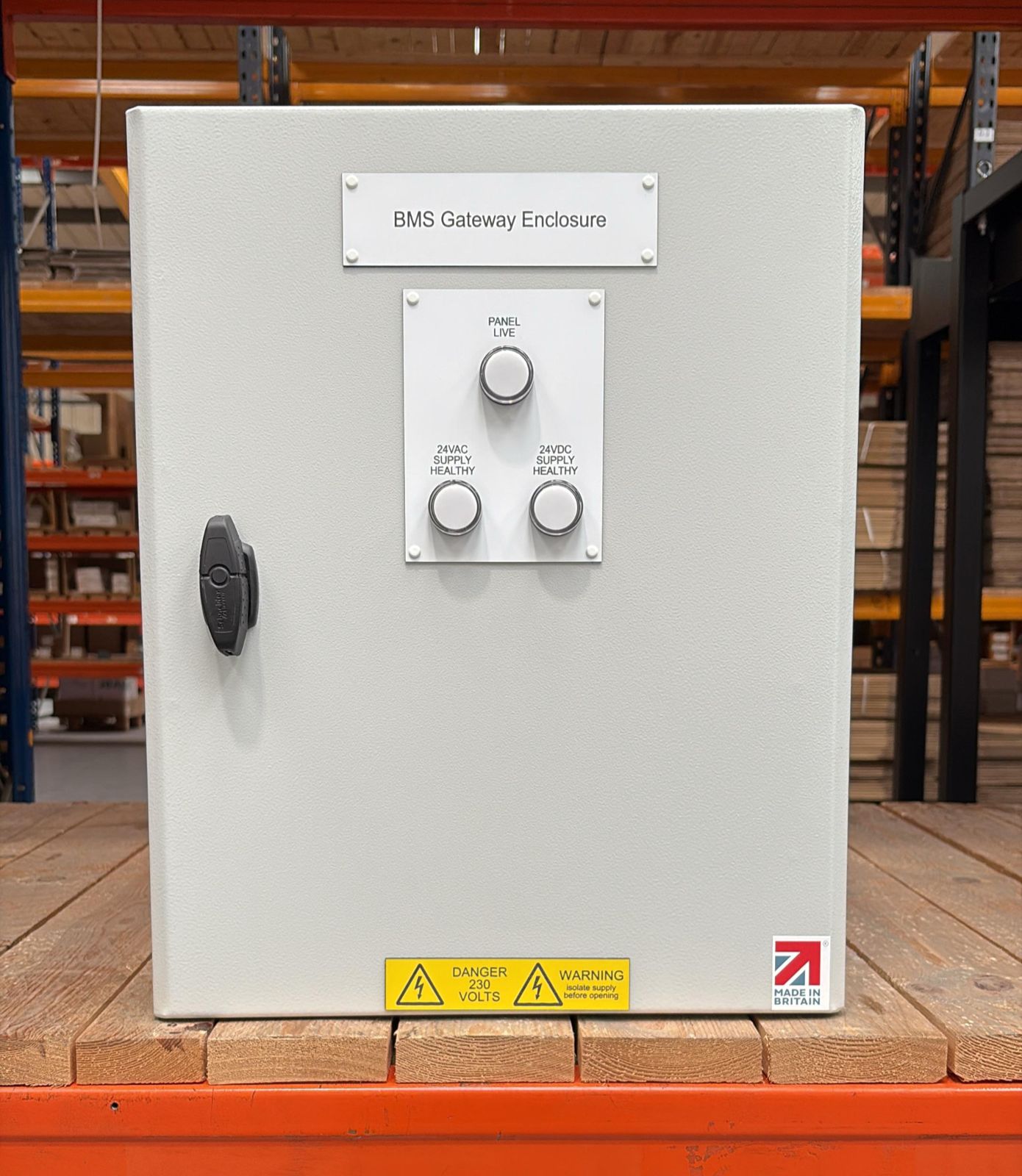 Evometrix Gateway panel, grey steel enclosure on a pallet